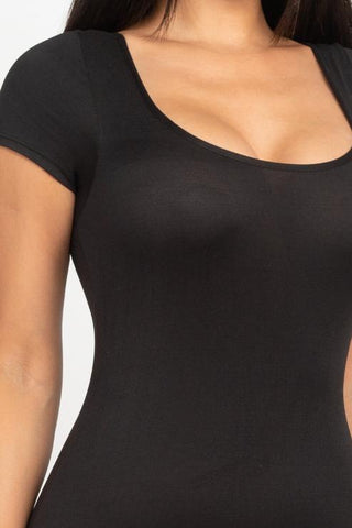 Close-up of a black short sleeve scoop neck bodycon romper, showcasing the tight yet comfortable fit