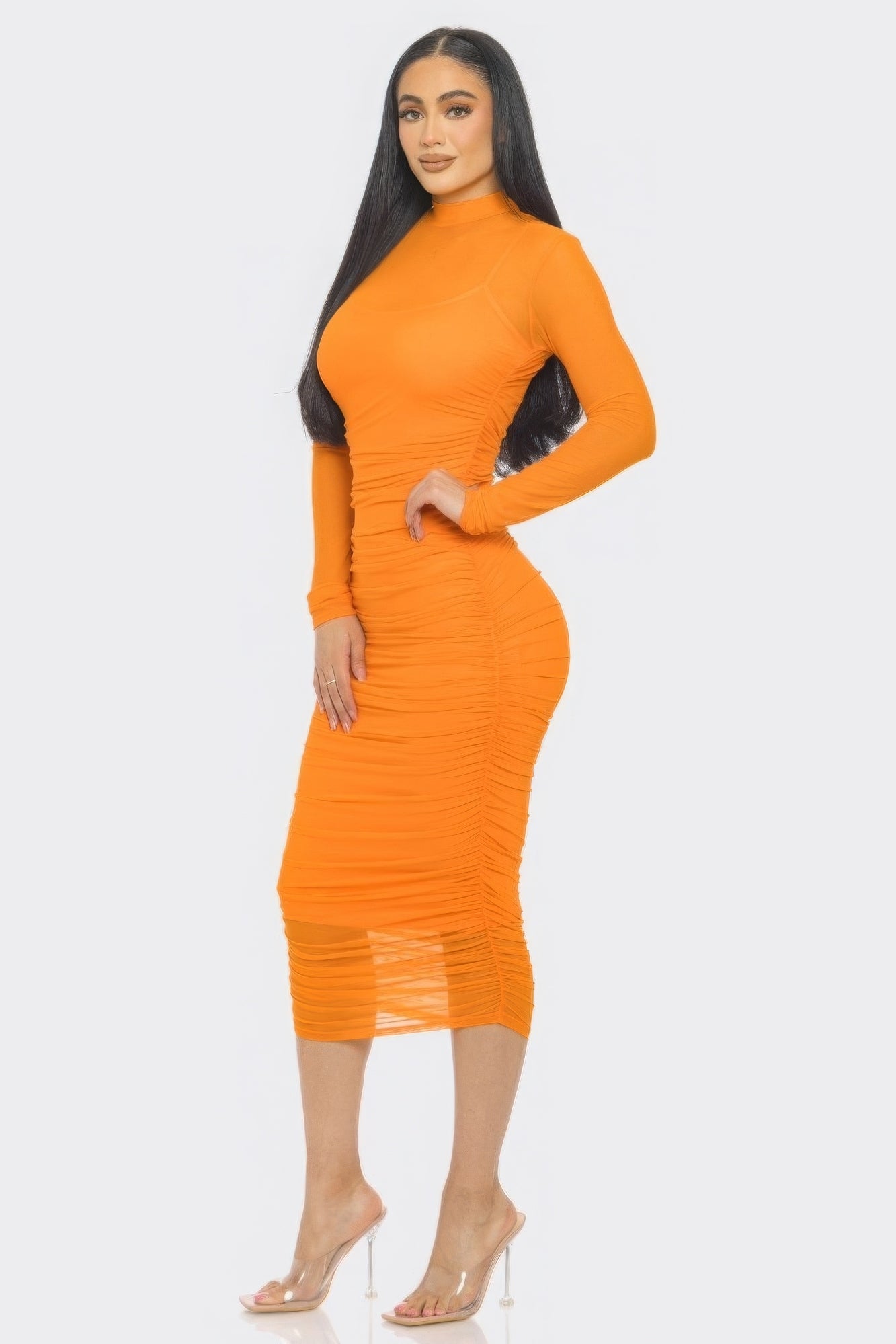 Elegant orange ruched midi dress with smock neck and long sleeves, showcasing a flattering silhouette for any occasion.