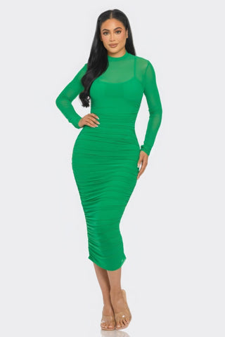 Green solid mesh ruched midi dress with long sleeves and smock neck, showcasing a flattering silhouette for versatile occasions.