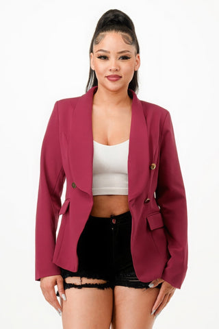 Woman wearing a Spring Me Double Breasted Blazer Jacket, featuring a classic lapel collar and long sleeves, in a stylish burgundy color.