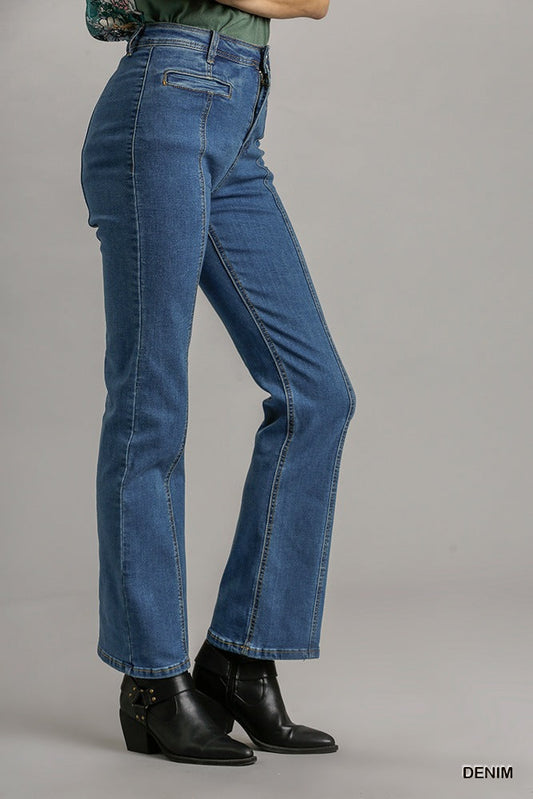 Straight cut denim jeans with pockets made from cotton, polyester, and spandex, showcasing modern style and comfort in blue fabric.