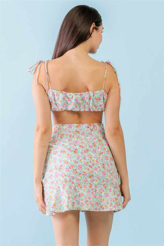 Floral strappy crop top and mini skirt set with self-tie straps, in mint and fuchsia print, featuring a girlish and trendy design.