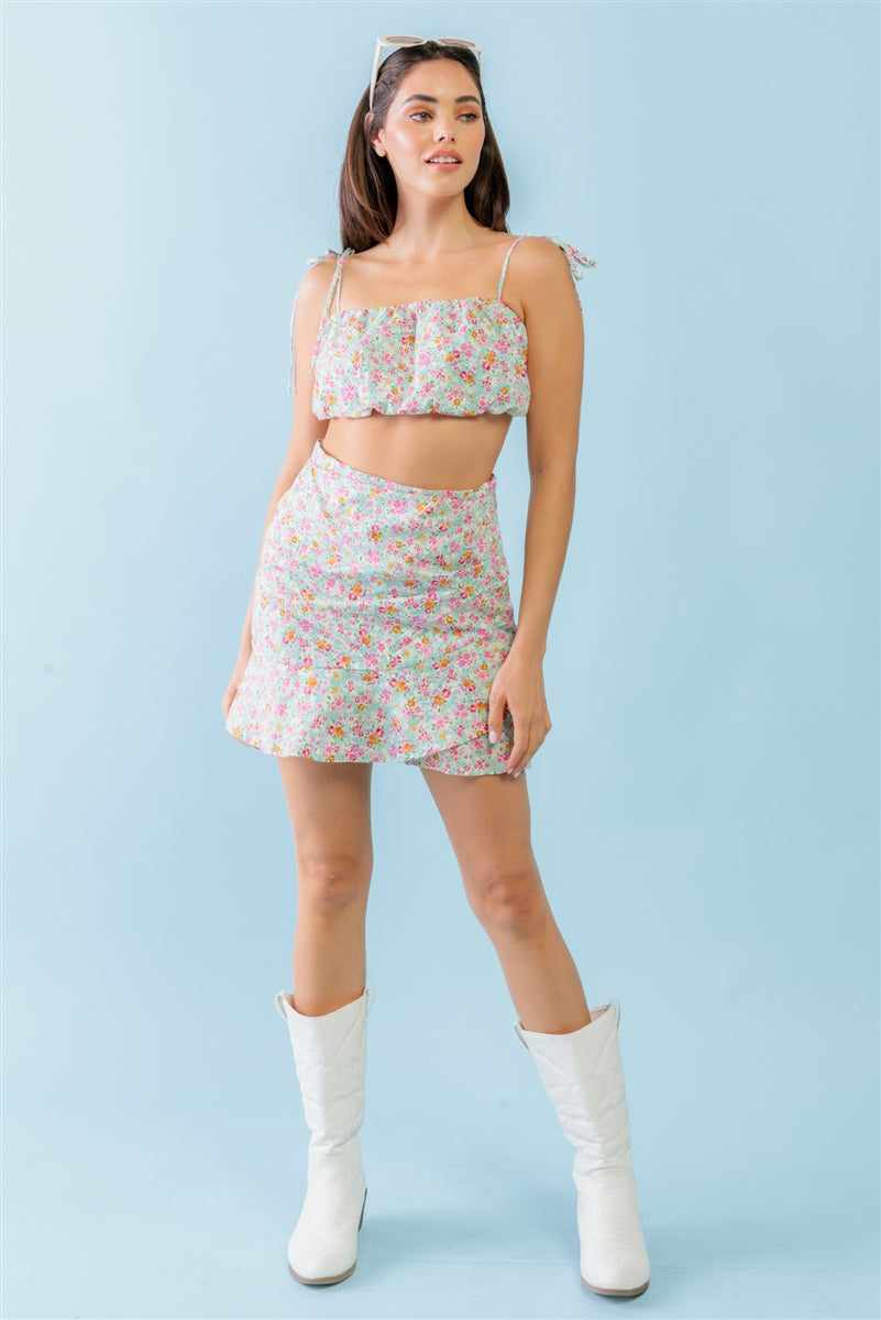 Mint fuchsia floral strappy crop top with high waist mini skirt set, sleeveless, cute girlish trendy fashion, model wearing boots.