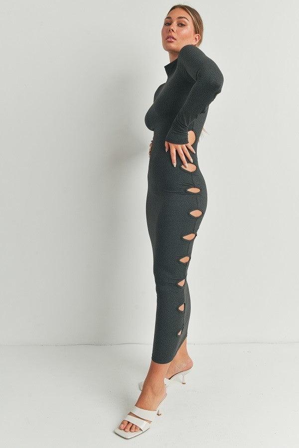 Woman wearing heather charcoal cutout detail maxi dress with side cutouts, standing against a white background