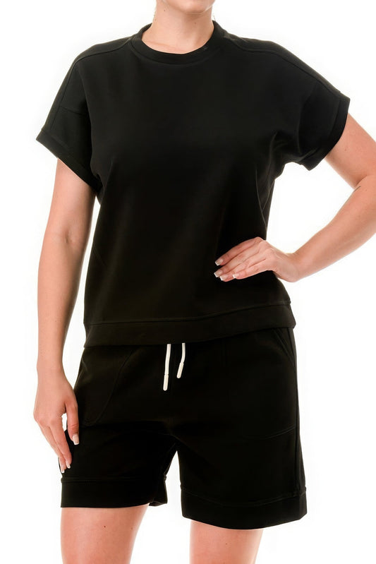 Black monochrome tee and shorts set in air cotton fabric for a casual summer look.