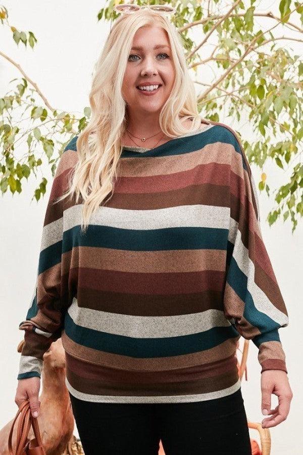 Woman wearing boat neck multi stripe print knit top with long bubble sleeves in hunter green and multi-color pattern.