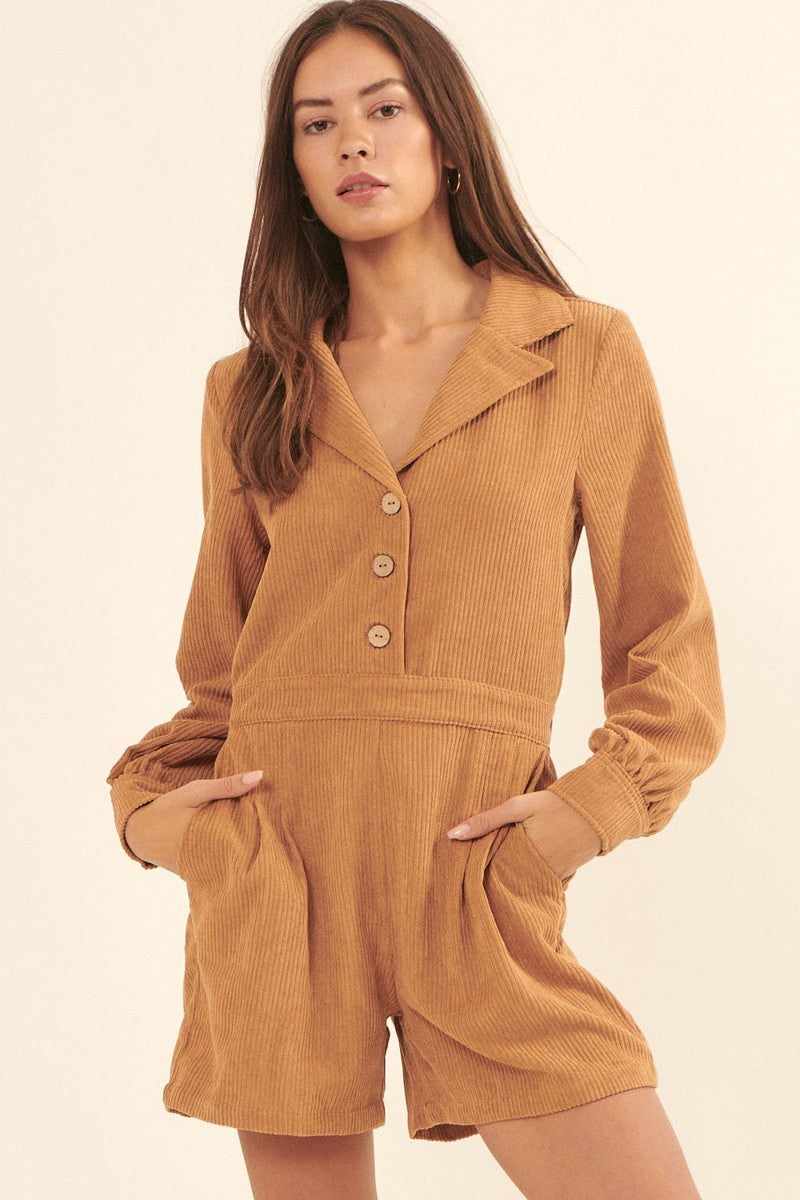 Woman wearing a taupe woven corduroy romper with lapel collar, long sleeves, and side pockets. Casual and relaxed fashion style.