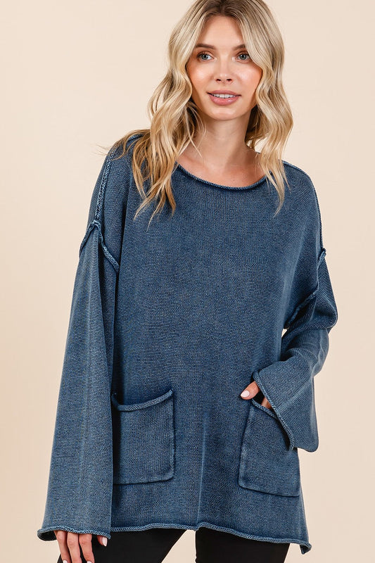 Woman wearing Mittoshop Mineral Wash Patch Pocket Cut Edge Sweater with exposed seams and stylish mineral wash design.