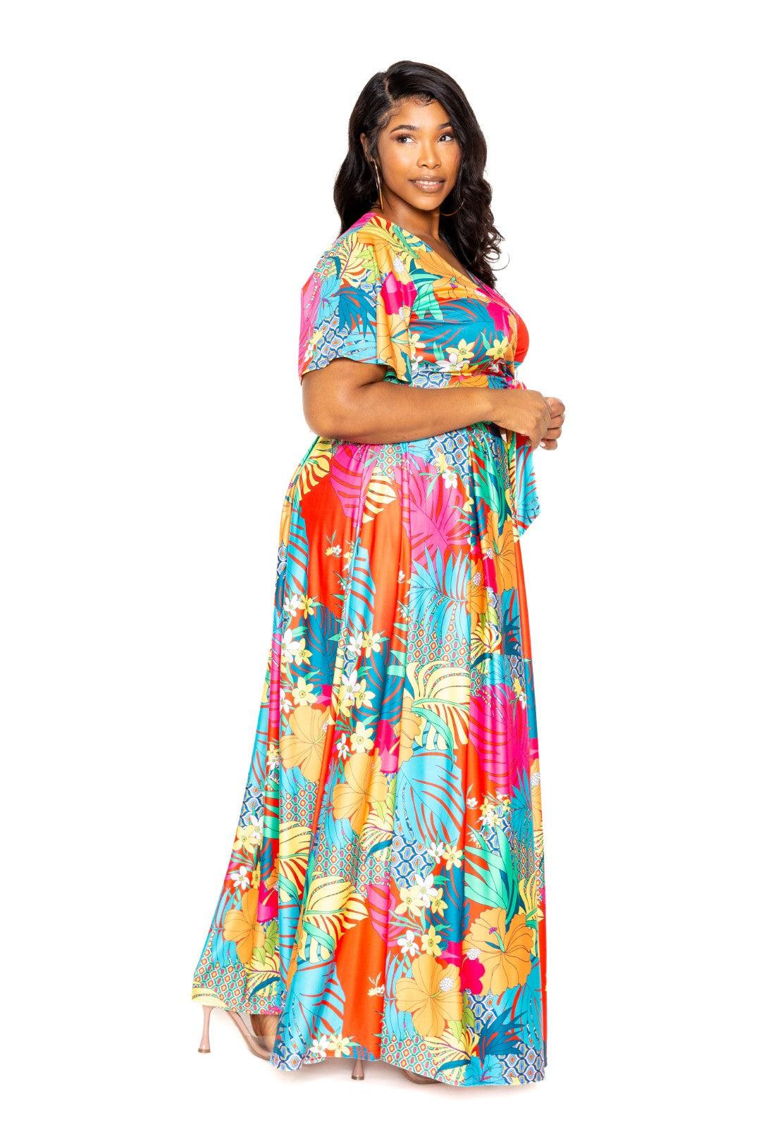 Plus size woman wearing vibrant tropical floral maxi skirt and top set, showcasing colorful BBA design, 1XL to 3XL sizes.