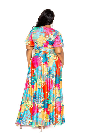 Plus size tropical floral maxi skirt and top set in vibrant colors, back view.