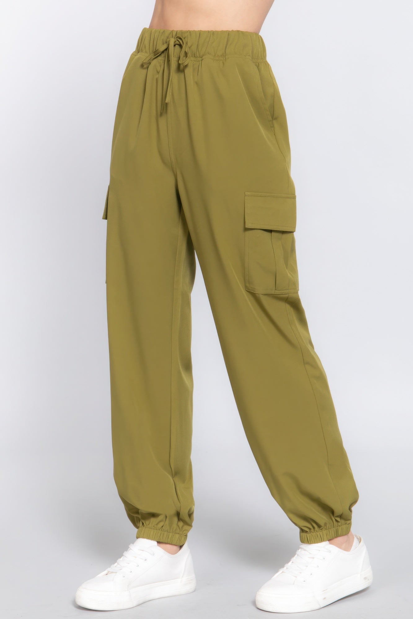 Lightweight stretch woven cargo jogger pants in olive green, featuring trendy cargo pockets and modern jogger silhouette.