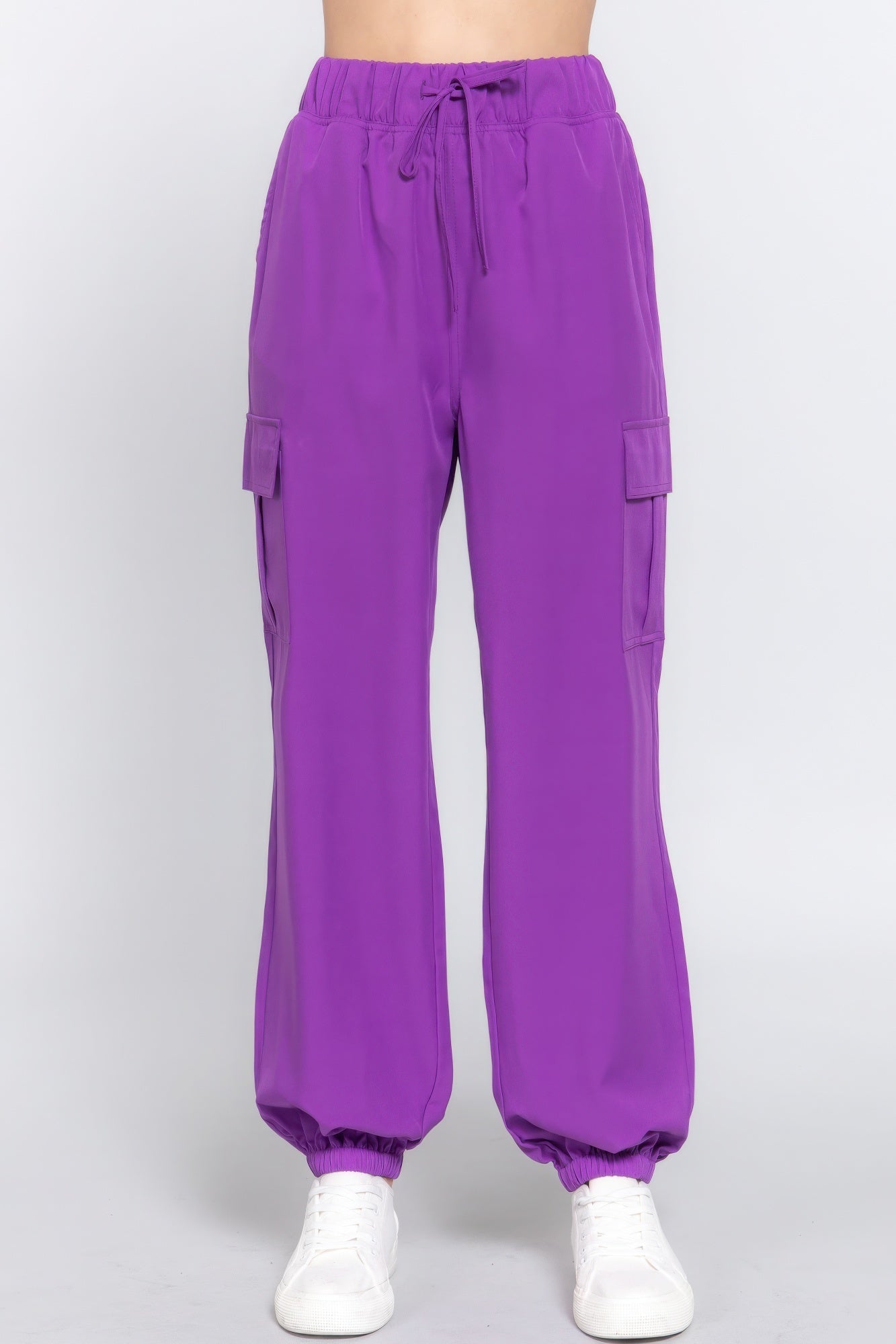 Stylish purple cargo jogger pants with modern silhouette and comfortable stretch woven fabric for casual wear