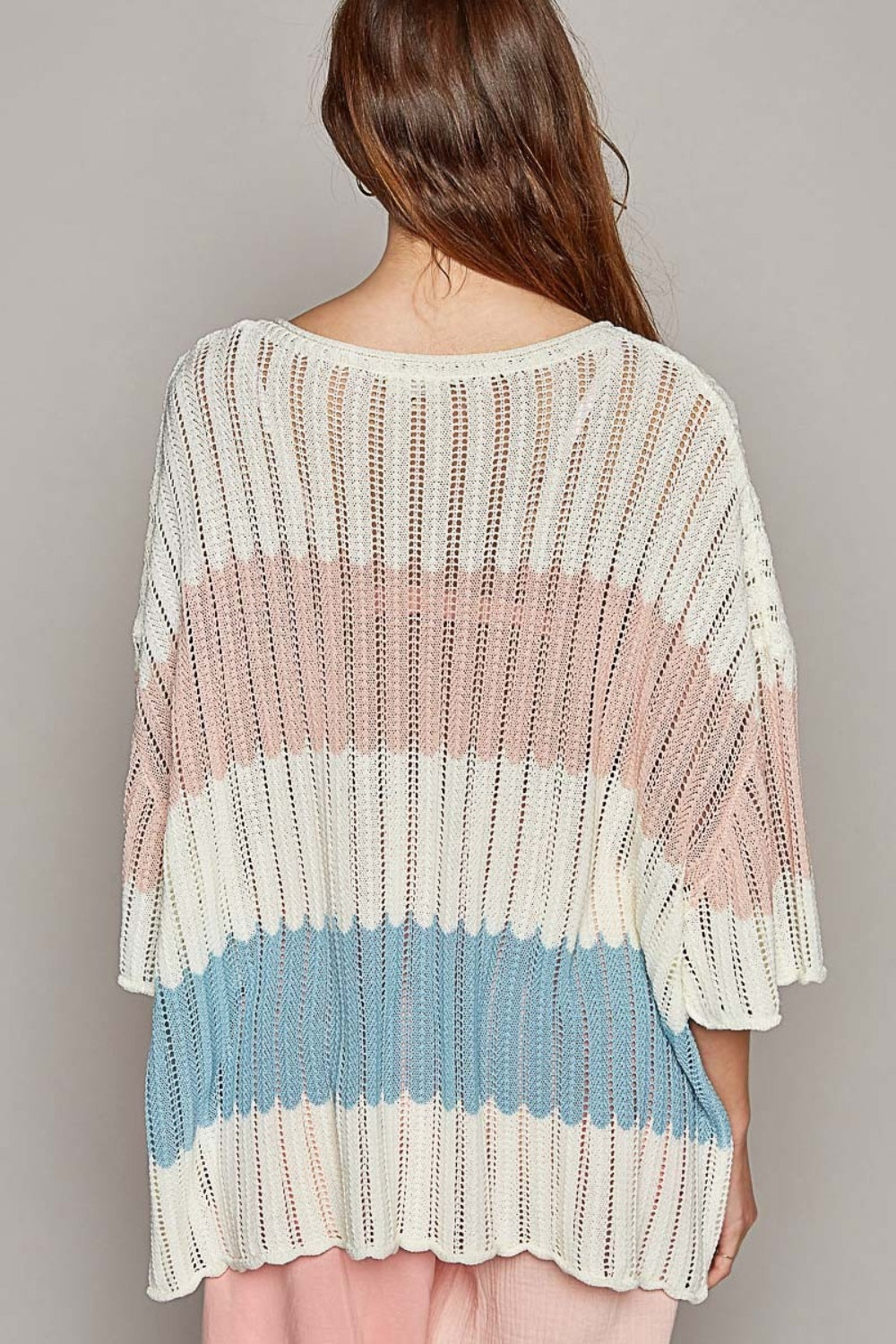 Woman wearing a V-neck short sleeve stripe weave sweater with pastel colors, openwork design, 100% acrylic material, no stretch