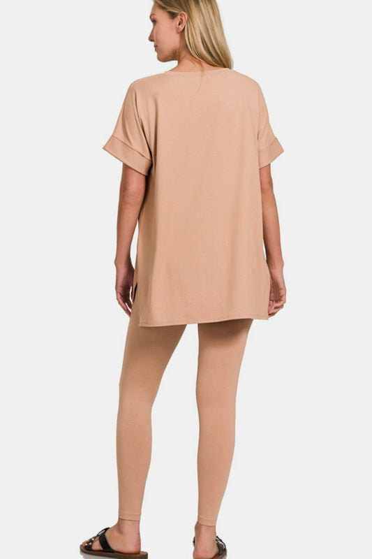 Woman wearing a chic V-neck rolled short sleeve T-shirt and leggings lounge set in beige, showcasing a casual, effortless style.