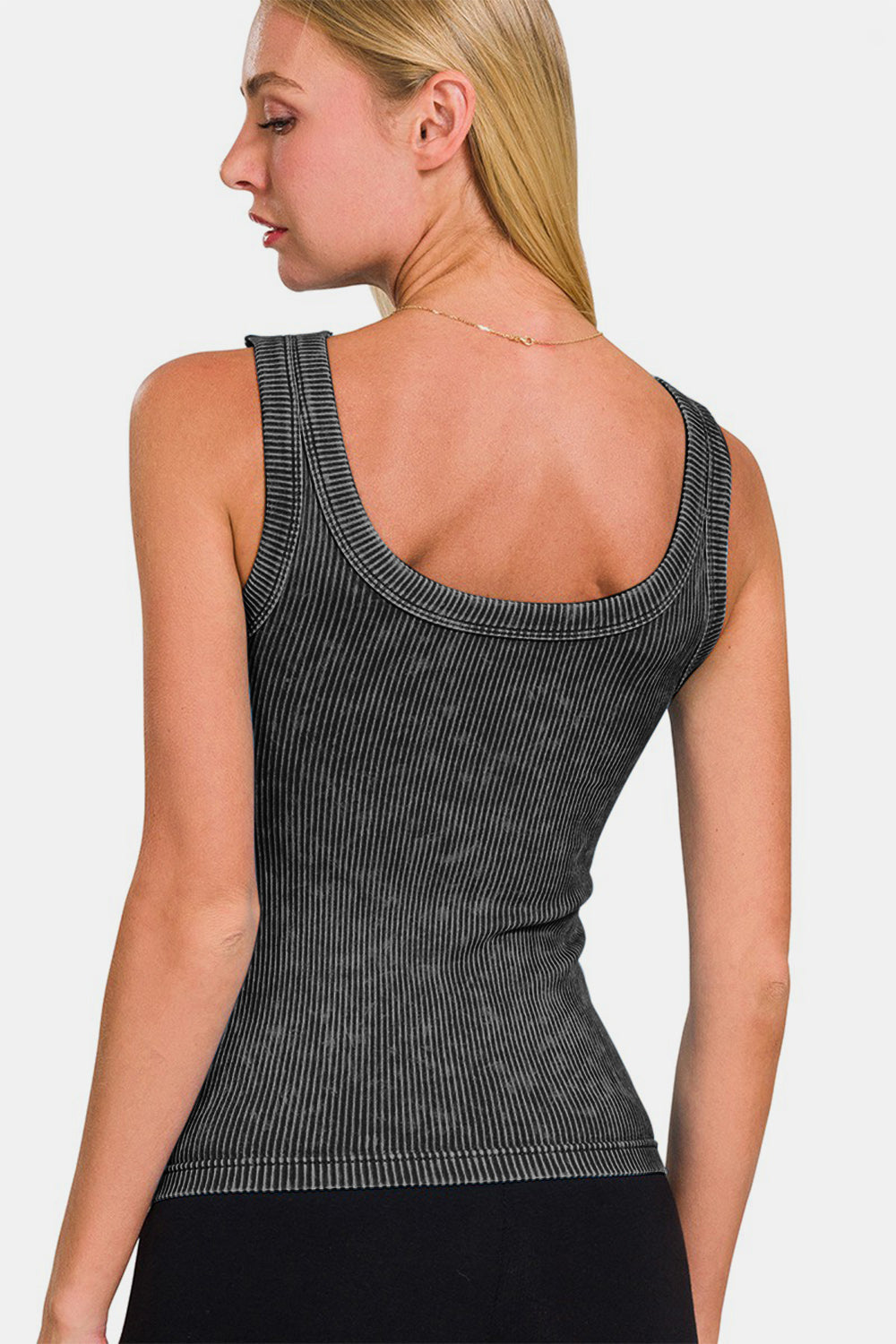 Woman wearing 2 Way Neckline Washed Ribbed Cropped Tank, showing back view with opaque, slightly stretchy nylon-spandex fabric.