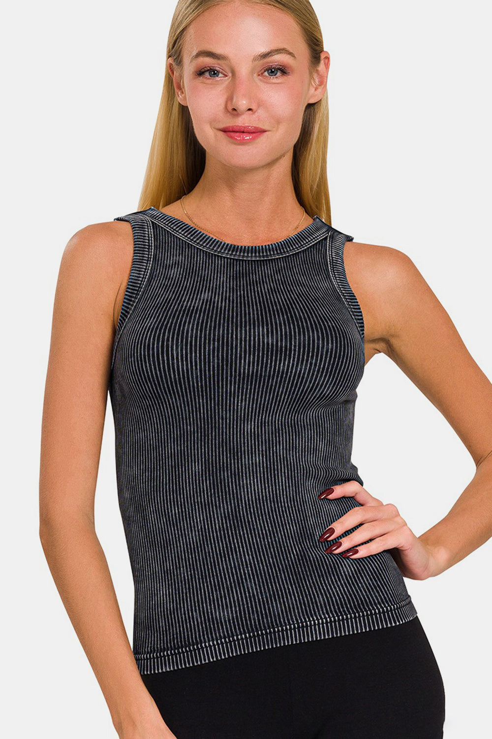 Woman wearing black ribbed cropped tank with 2-way neckline, slightly stretchy opaque fabric, nylon-spandex blend.