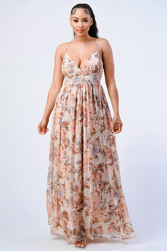 Vintage floral chiffon fit and flare maxi dress in blush, V-neck, smocked design, worn by model. 100% polyester.