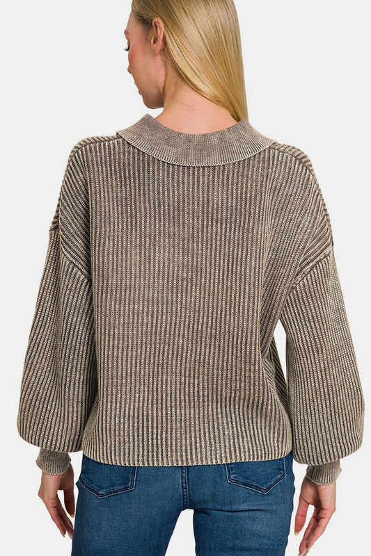 Woman wearing a washed half button long sleeve sweater in 100% cotton with a slightly stretchy fit, viewed from the back.