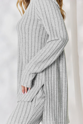 Basic Bae ribbed high-low top and wide leg pants set in gray, showcasing side view with textured fabric and relaxed fit.