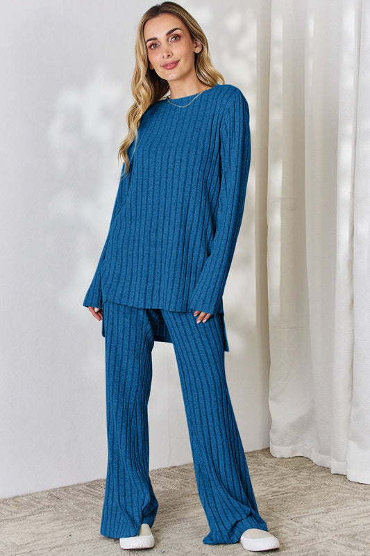 Blue ribbed high-low top and wide leg pants set, two-piece outfit with slight stretch, perfect for casual elegance.