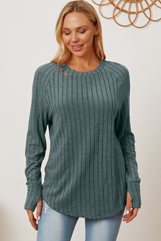 Woman wearing Basic Bae ribbed thumbhole sleeve t-shirt in teal, showcasing its casual and comfortable style.
