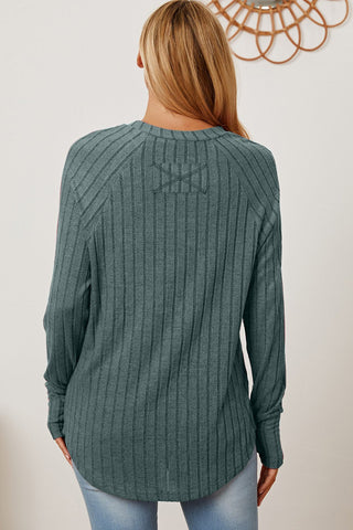 Woman wearing a Basic Bae full size ribbed thumbhole sleeve T-shirt in grey, showcasing the back design.