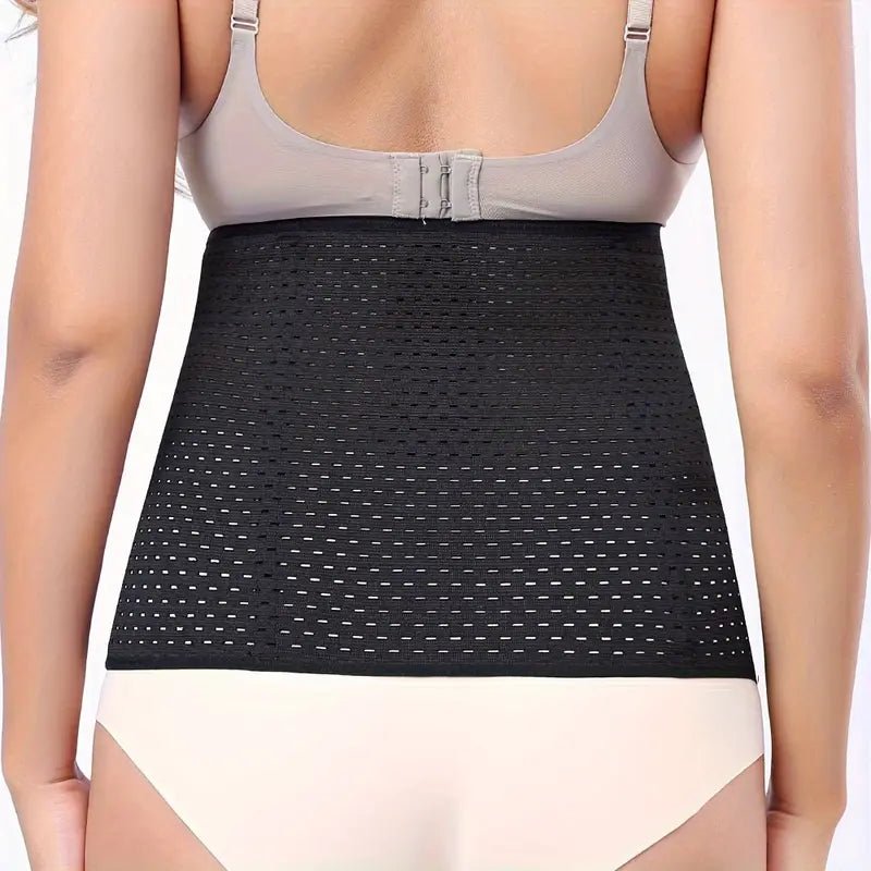 Woman wearing adjustable black waist trainer belt with medium control and 6 rows of hooks, enhancing slimming effect, rear view.